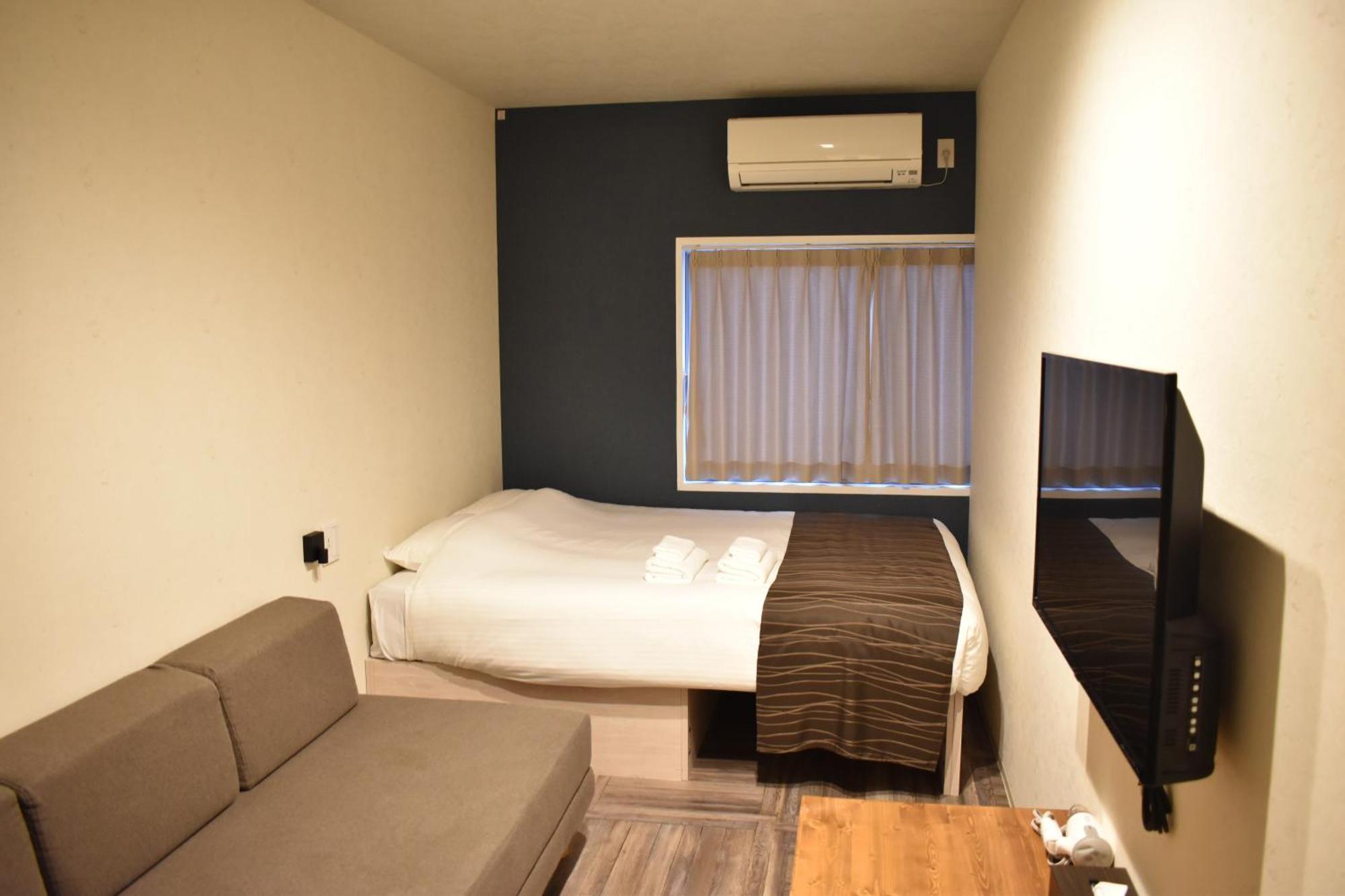 Shinsaibashi House Hotel Osaka Værelse billede