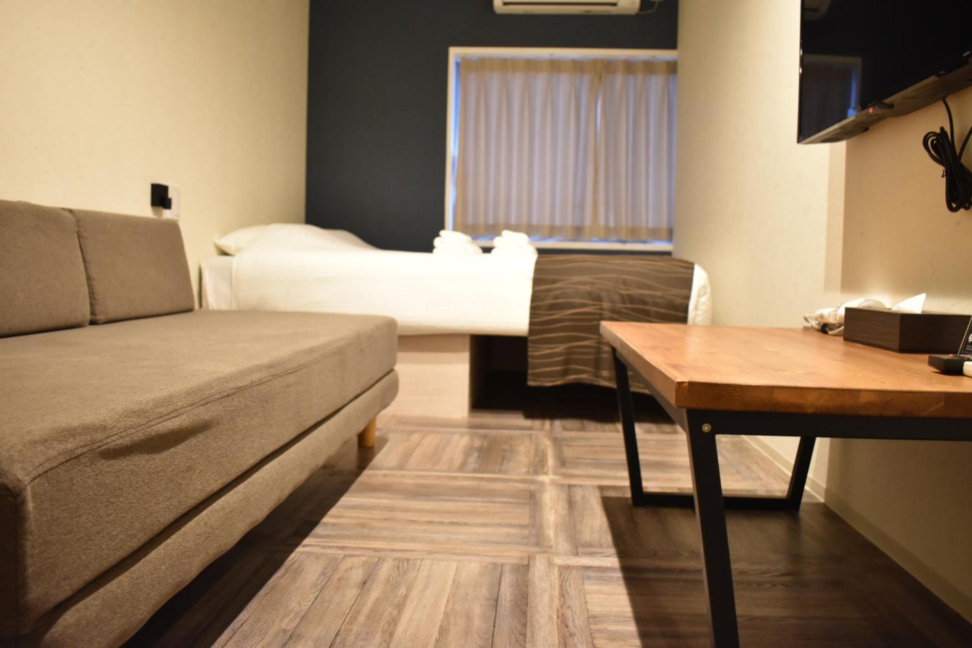 Shinsaibashi House Hotel Osaka Værelse billede
