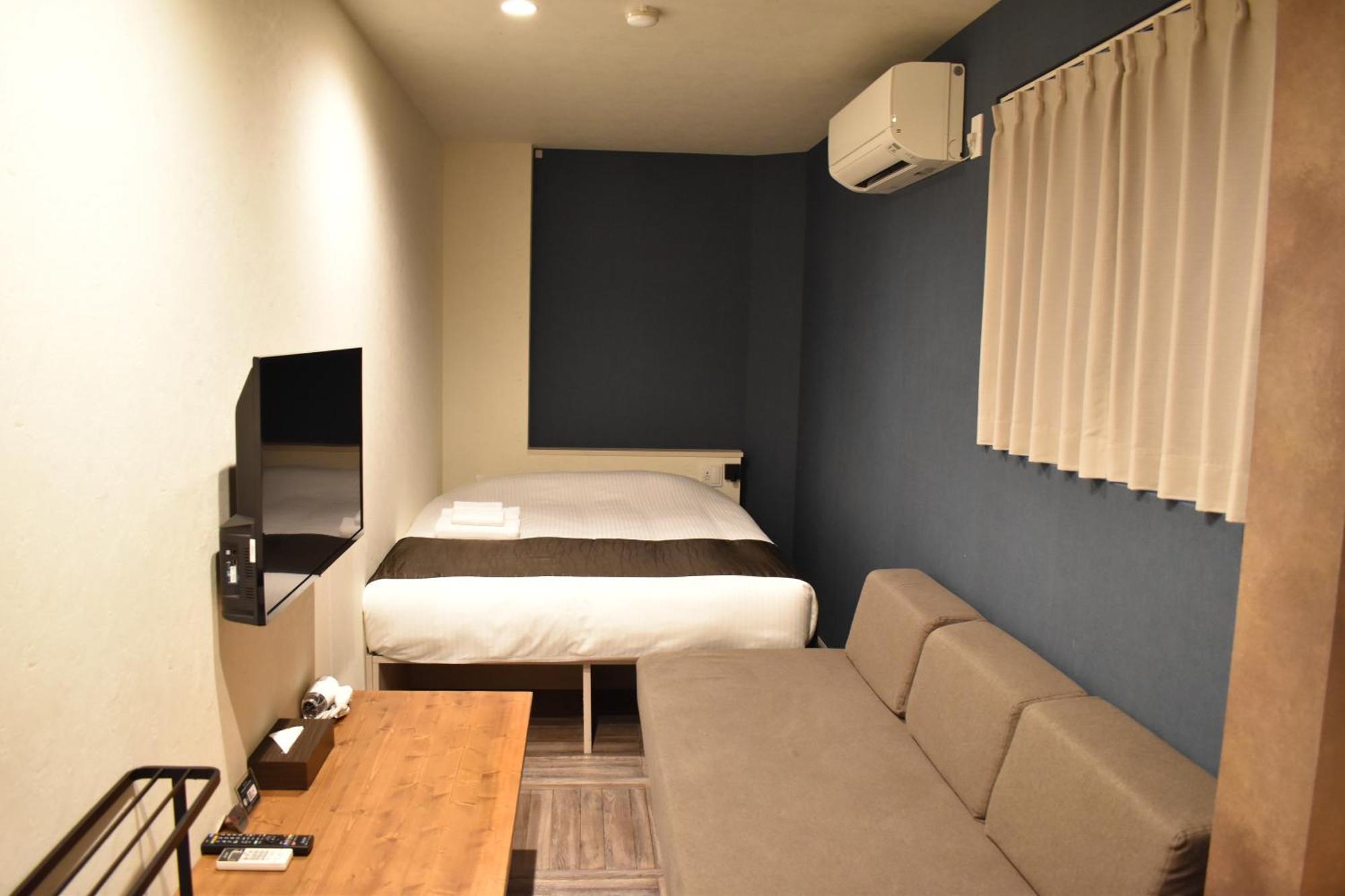 Shinsaibashi House Hotel Osaka Værelse billede